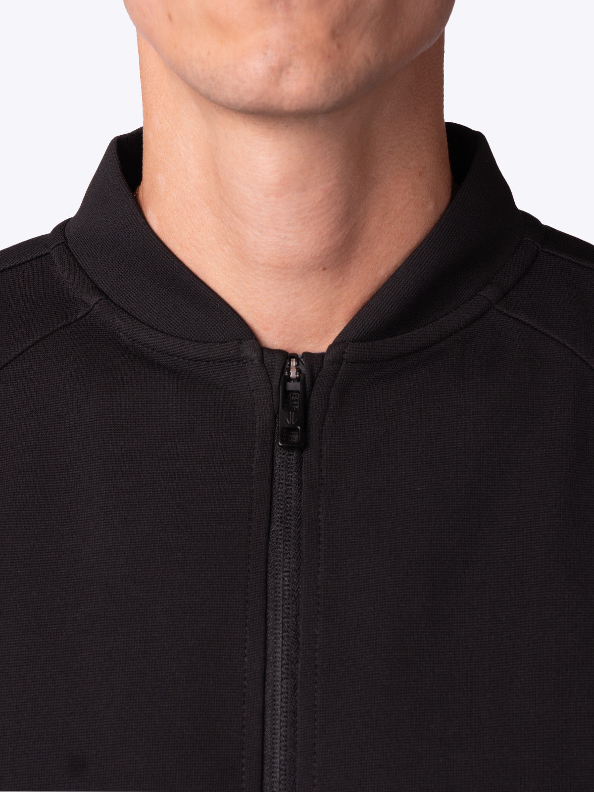 Close-up of the bomber collar on a RangeRoamer Jacket in Onyx Black by Loogaroo||||Onyx